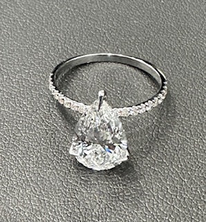 Pear shape diamond engagement ring