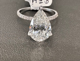 Close up view pear diamond engagement ring