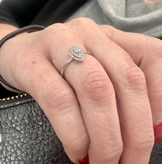 Diamond pear ring white gold on hand