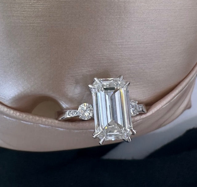 Close up emerald cut engagement ring