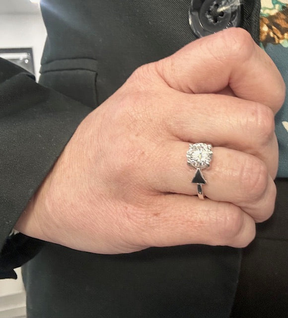 IGI certified lab grown diamond ring with onyx on hand
