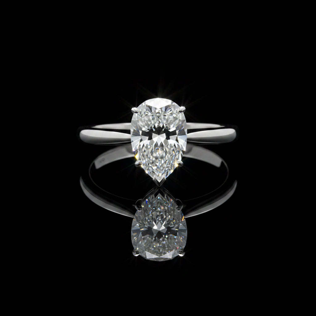 1 CT pear shape ring in white gold
