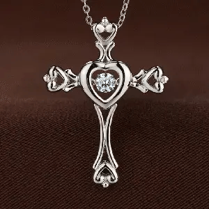 sterling silver cross with diamond in center