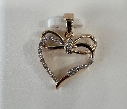 Natural diamond heart pendant with a bow