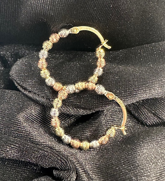 gold hoops with ball design
