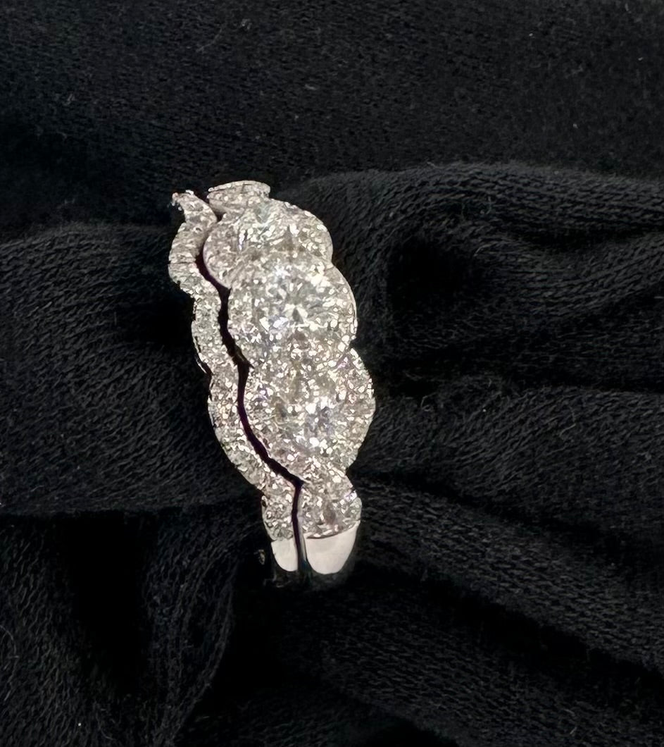 Three stone diamond set in white gold
