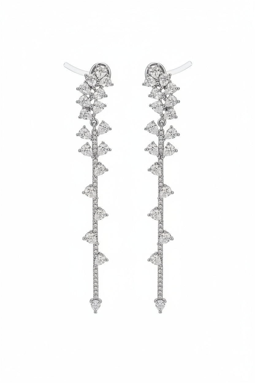 2.5 in long dangling diamond earrings on white background