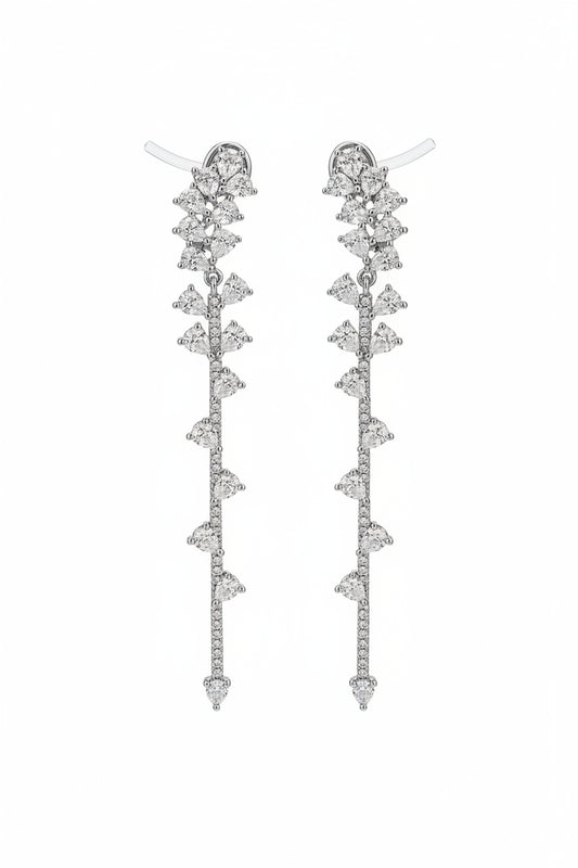 2.5 in long dangling diamond earrings on white background