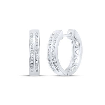 Pair of diamond hoop earrings on a white background