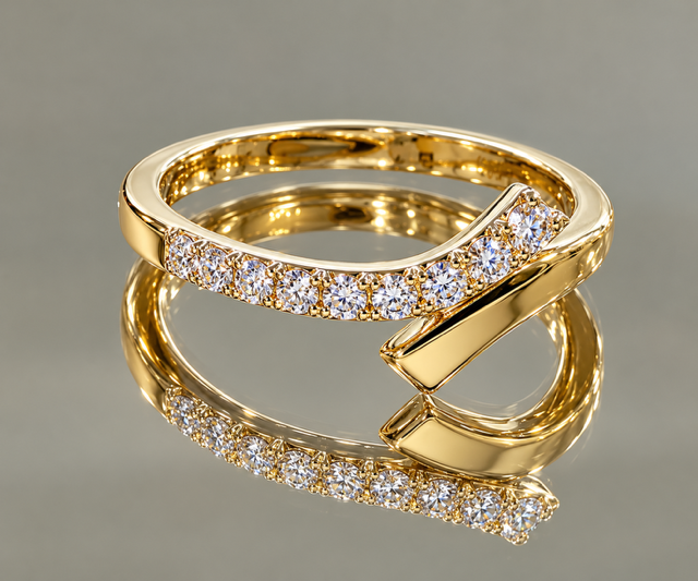 yellow gold ring with single row of diamonds on half of ring