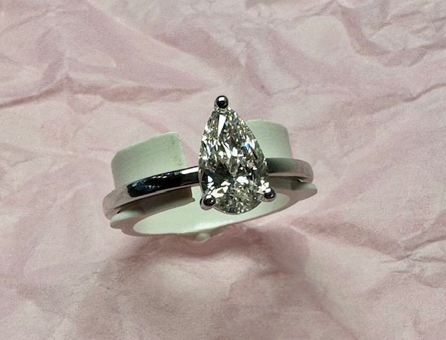 Pear shape solitaire engagement ring