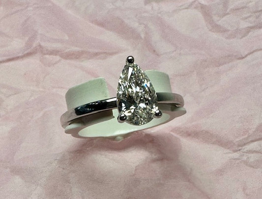 Pear shape solitaire engagement ring