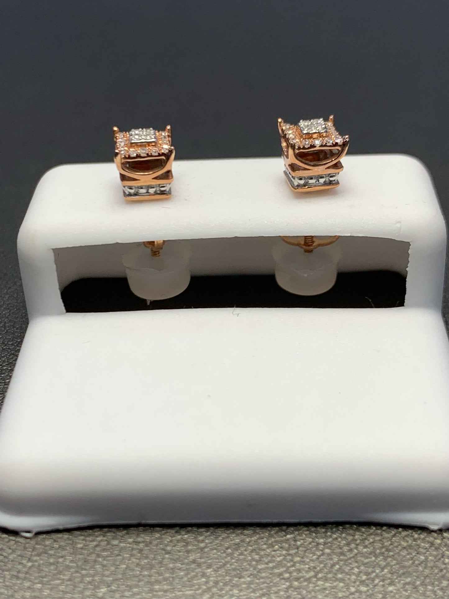 Side view diamond and rose gold studs