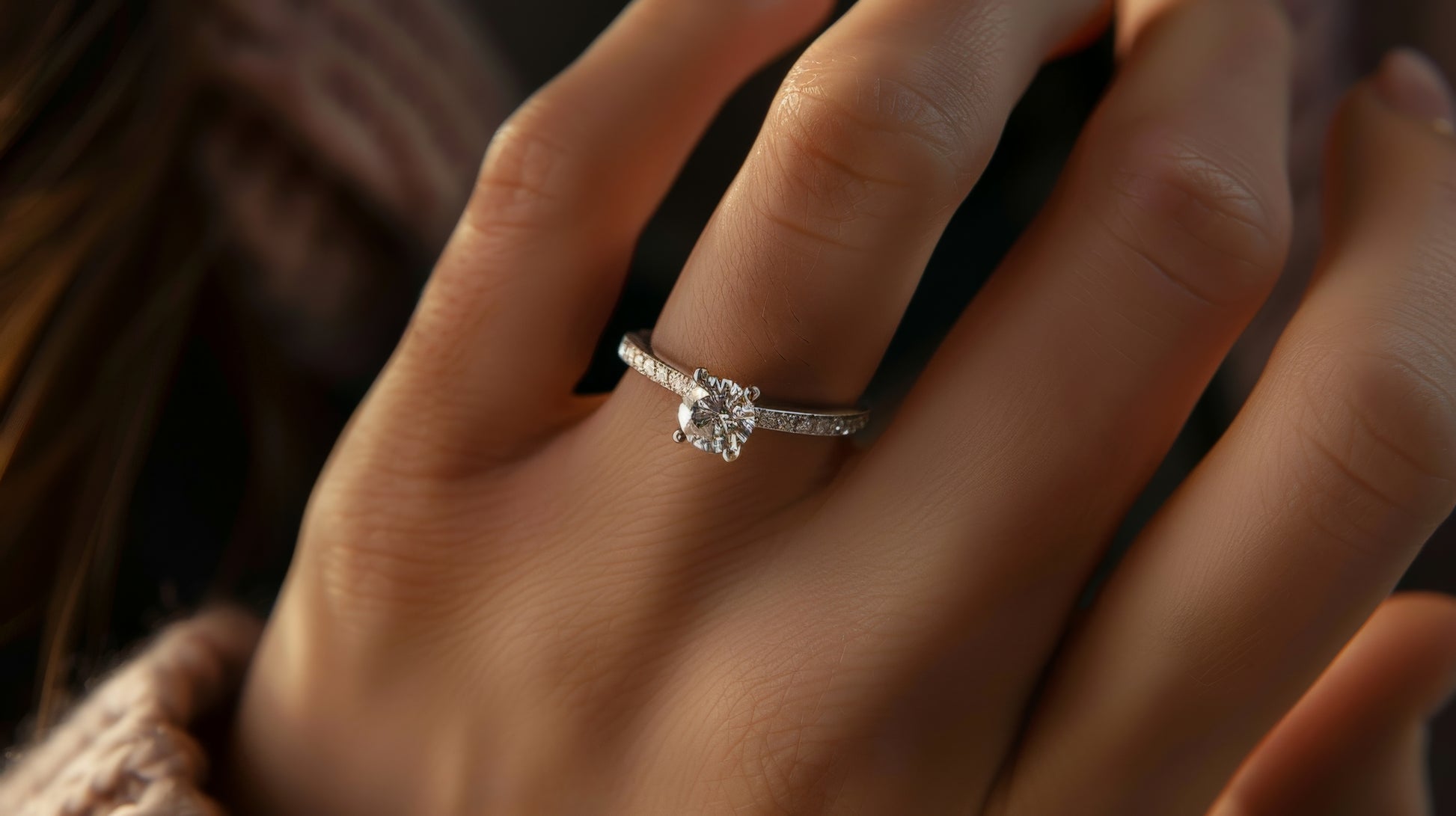round brilliant lab diamond engagement ring on hand
